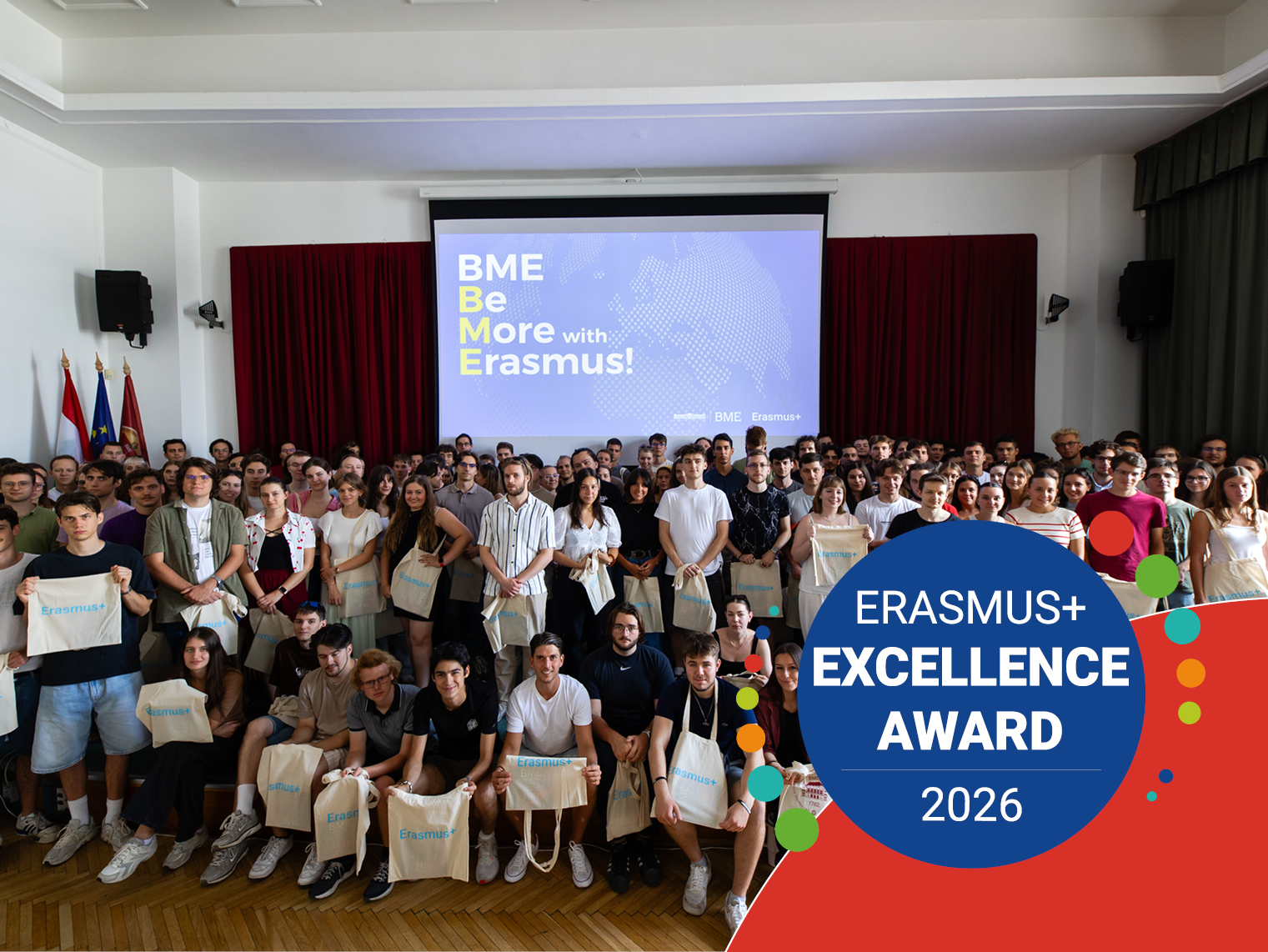 Group photo of BME students with Erasmusplus tote bags at the Erasmusplus Excellence Award 2026 event